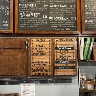 menus on the wall of the restaurant