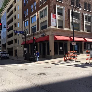 View of outside of cafe, located at corner of 10th &amp; Walnut.