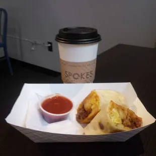 Med. coffee and chorizo breakfast burrito.. Hot and delicious..yum!