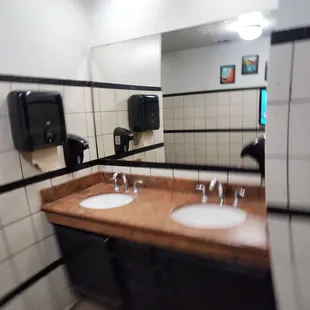 two sinks in a public restroom