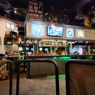 a bar with bikes on the wall