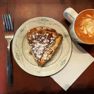 a piece of cake and a cup of coffee