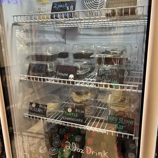 a refrigerator filled with drinks
