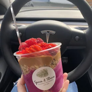 Pitaya bowl with granola, banana, strawberry, raspberry, and add peanut butter.