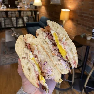 The Zimmy - an egg, brie, nutty slaw, and bacon sandwich on ciabatta