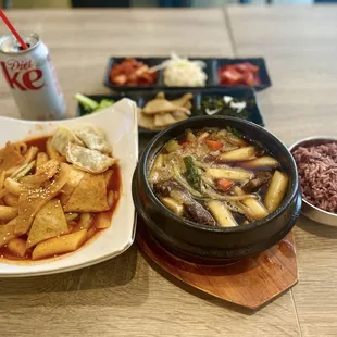 Tteokbokki, Galbi Jjim, Purple Rice (Front - L to R) Banchan (Back)