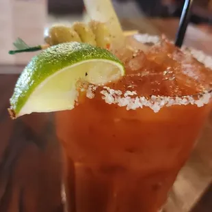 a bloody drink with lime and salt