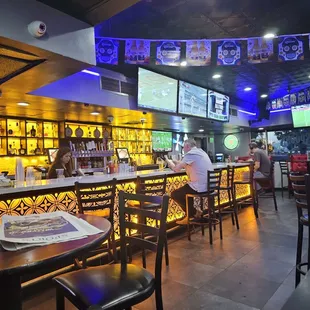 people eating at the bar