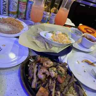 Fajitas trio . Chicken, asada, shrimp