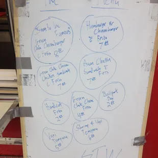 a white board with writing on it