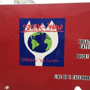 a red truck with a globe on it