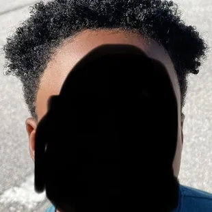 Front view. I can't believe she took it off. Other customers walk out with hairlines, why take my sons off.... Never again.