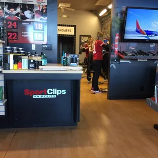 Inside of the Woodcreek SportClips.