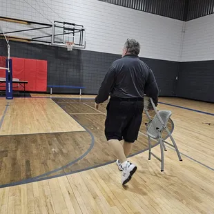 Mr. Grumpy pants, the facilities manager,  took the chair I was sitting on