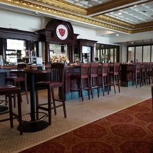 Full bar and rich ambiance of wood and gold inlay.  Very warm atmosphere.
