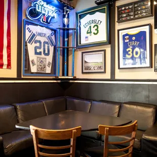 a booth with a table and chairs