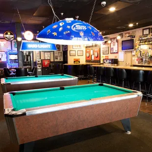 a pool table and bar