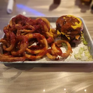 Onion rings with the 2 gunz special....burger with sauces
