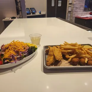 Wine, fish, and salad