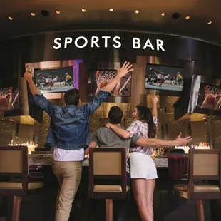 a man and a woman at a bar