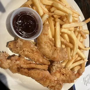 Chicken tenders with fries.