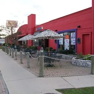 Patio seating, along with a built in table fire place for warm summer nights