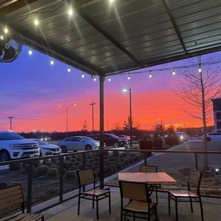 a view of a parking lot at sunset
