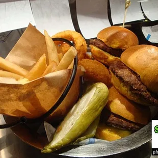 a basket of burgers and french fries