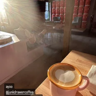 a cup of coffee on a table
