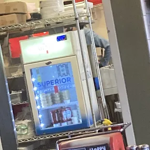 All Employees hanging out, laughing in the back as we stood at the counter waiting.