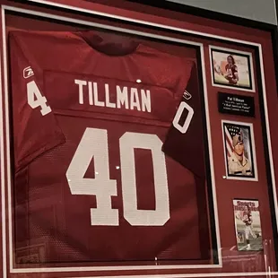 a football jersey in a frame
