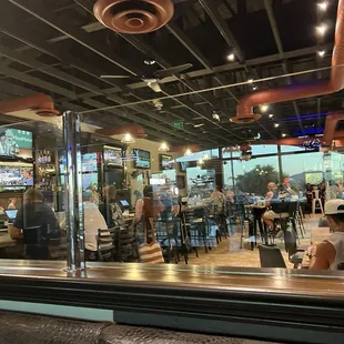 Extended seating area with TVS and bar