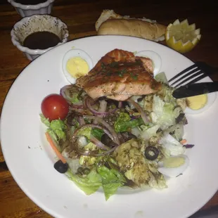 Grilled Salmon Salad with Dijon Vinaigrette dressing.  Served with toasted bread.