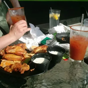 2 Bloody Mary's dry rub Old Bay wings and mild wings the best ever. Logan is the best ever thank you so much girl for such a great time.