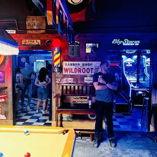 Entrance to darts and ping pong and basketball area