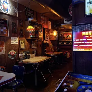 Cozy game table area near bathroom