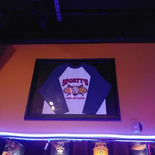 a baseball jersey on the wall