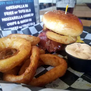 Super cheesy bbq Rodeo Burger and added onion rings. Delicious!