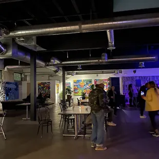 a group of people standing in a room