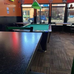 Cool little spot with pool tables