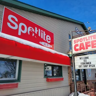 a woman walking in front of the store