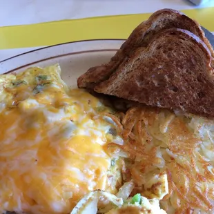 Denver omelette with hash browns and toast.