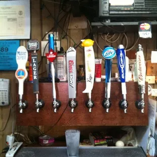 a row of beer taps