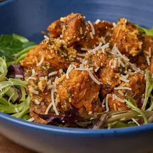 Brined and fried cauliflower tossed in garlic Parmesan sauce.