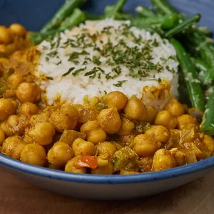 Chickpeas stewed in coconut masala curry sauce. Served with flash fried greens beans over grain.