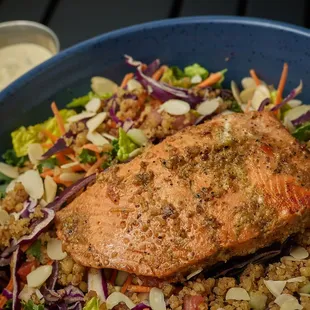 Kale, romaine/spinach, tomatoes cucumber, radish seasoned seeds, almonds walnuts, Caesar /chili lime dressing