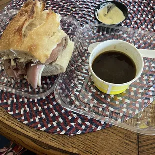 Freshly made Roast Beef Sandwich with Au Jus. The owner made the roast beef himself.