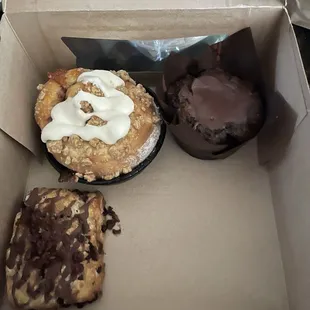In the back: Peach Cobbler Roll, Olympic Chocolate Muffin, and in the front a Candied Bacon Chocolate Scone.
