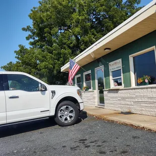a white truck parked outside