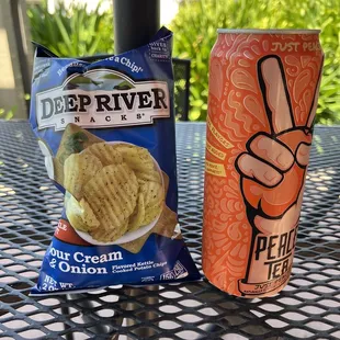 a can of deep river potato chips next to a can of deep river potato chips